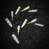 Title Snowfeather Foil | Icy White Ink-Leaf Press-On Nails