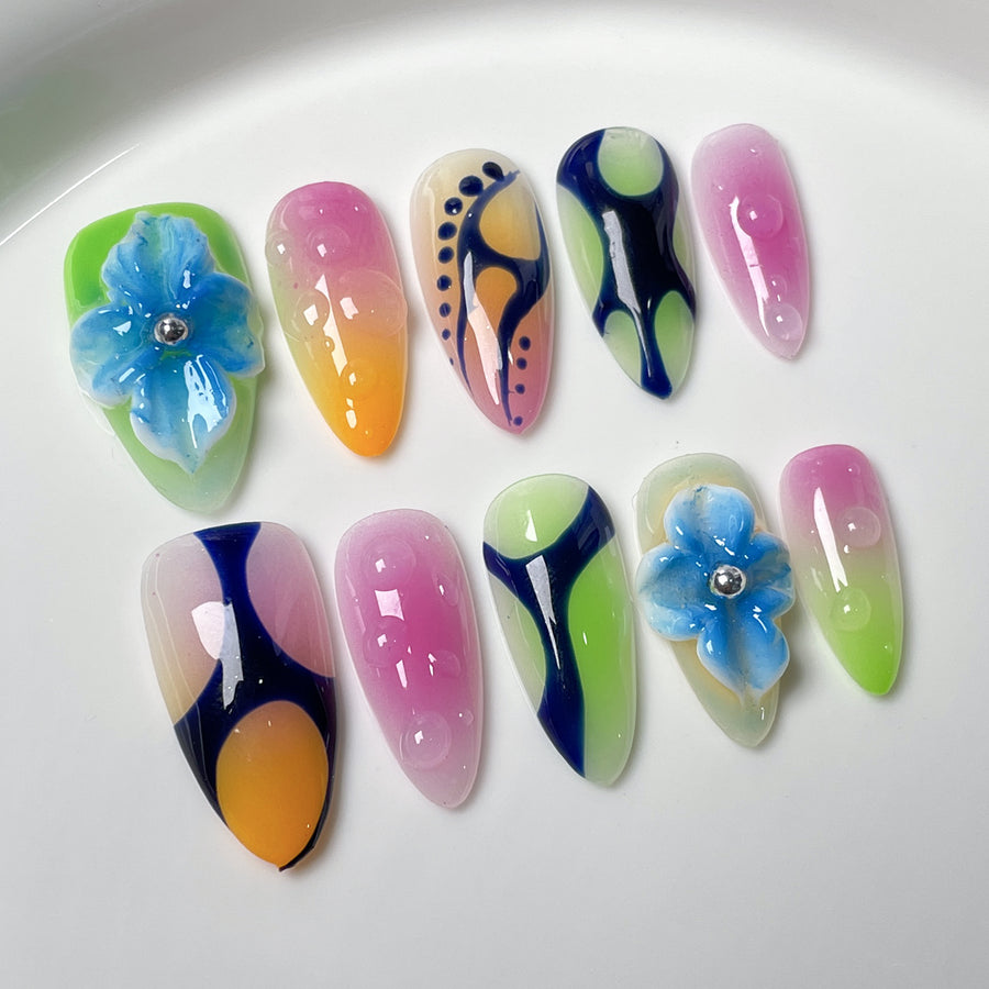 Color-Blend Nails with Irregular Lines and 3D Floral Accents