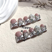 Nude French Nails with Silver Butterfly Crystal Embellishments