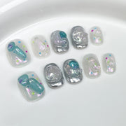 Icy Cute Iridescent Nails with Sculpted Bubble Accents