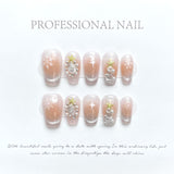Nude Christmas Press‑On Nails – Snowflake & Pearl Star Design