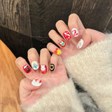 Colorful Christmas Press‑On Nails – Santa, Reindeer & Number Design