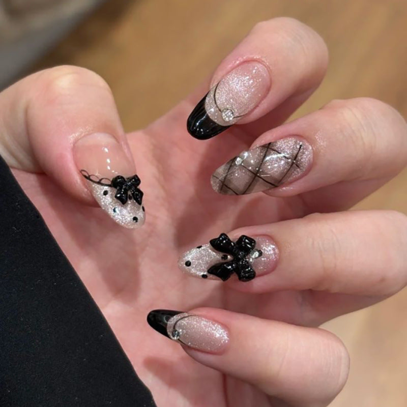 Short Almond Press On Nails with Black Bows & Glitter Web Design