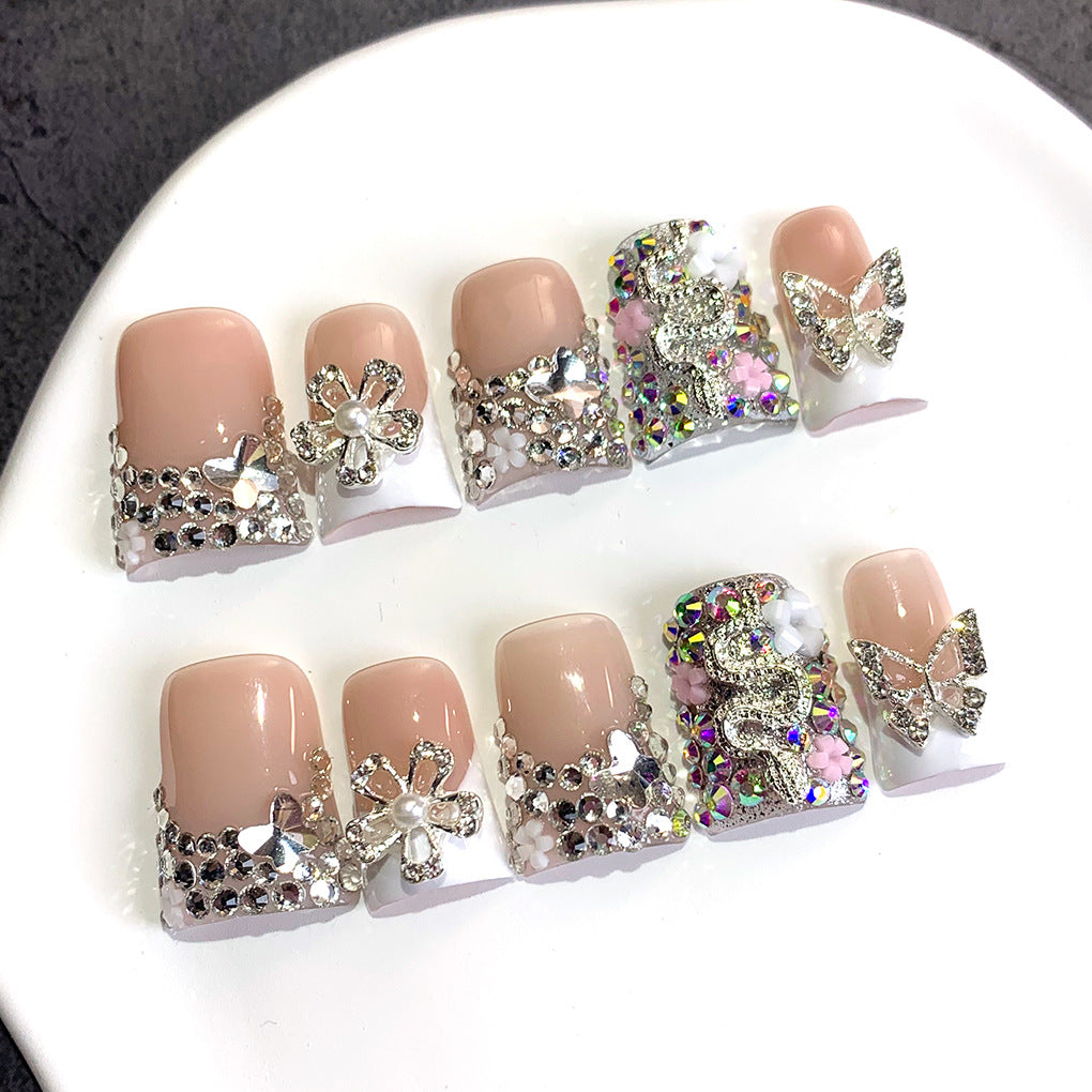 Nude French Nails with Silver Butterfly Crystal Embellishments