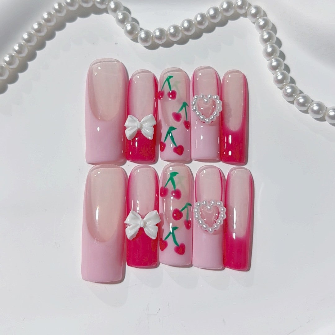 Valentine's day press-on nails: french cherry, bow, and heart designs