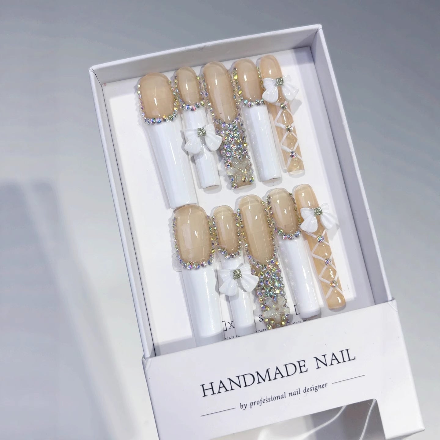 Soft Nude French Bow Crystal Elegance Press On Nails