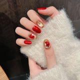 Red & Gold Christmas Press‑On Nails – Gift Box and Ornament Design