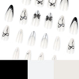 Sweet and Cool Short Almond French Black Metal Bow press-on nails