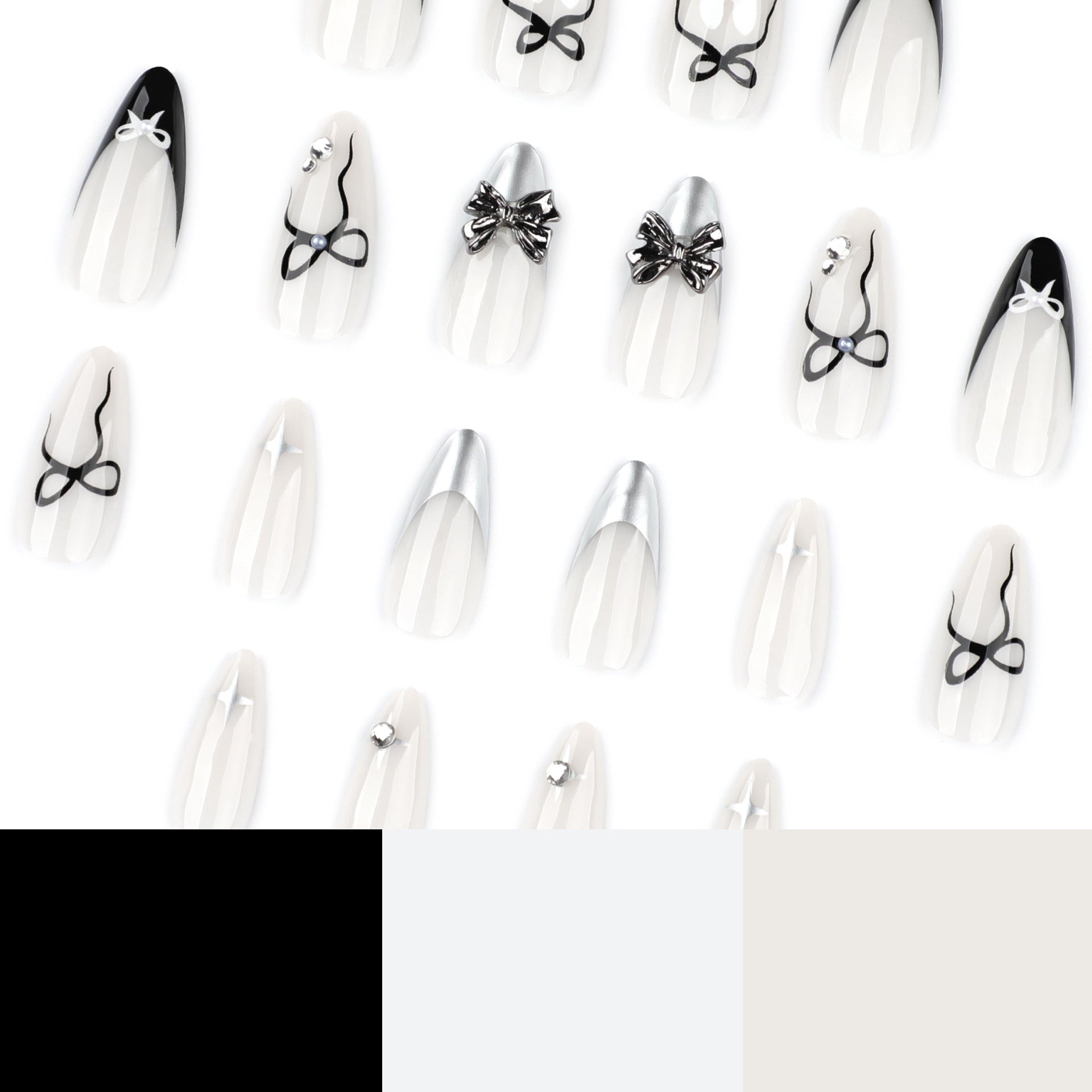 Sweet and Cool Short Almond French Black Metal Bow press-on nails