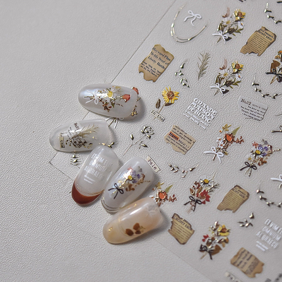 365nails: "letra vintage em folha de flor seca" – Adesivos para unhas