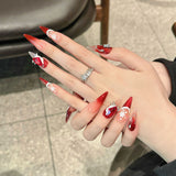 Red Gradient Christmas Press‑On Nails – Snowflake & Gem Bow Design