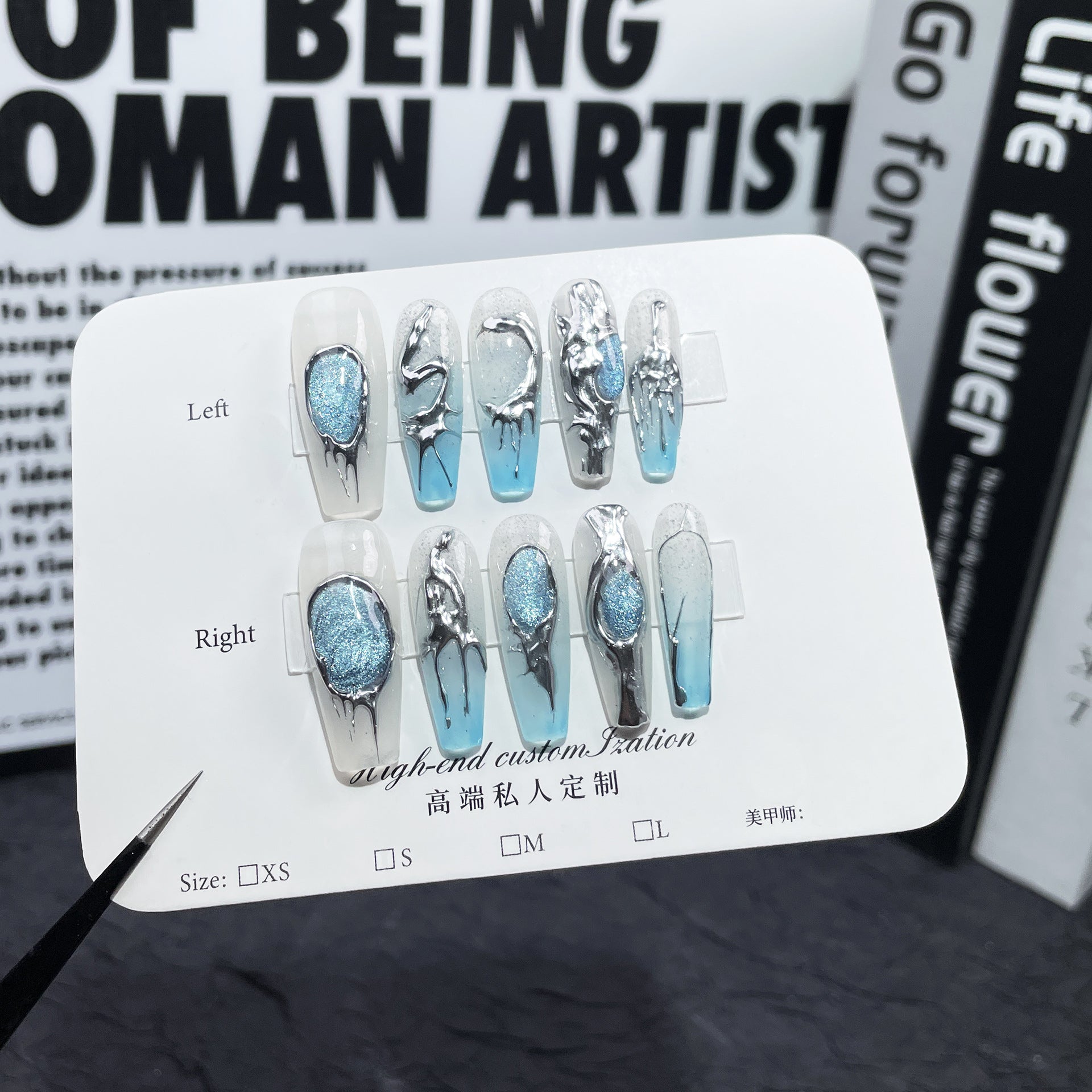 Blue Gem Cat-Eye Nails with Sculpted Metallic Accents