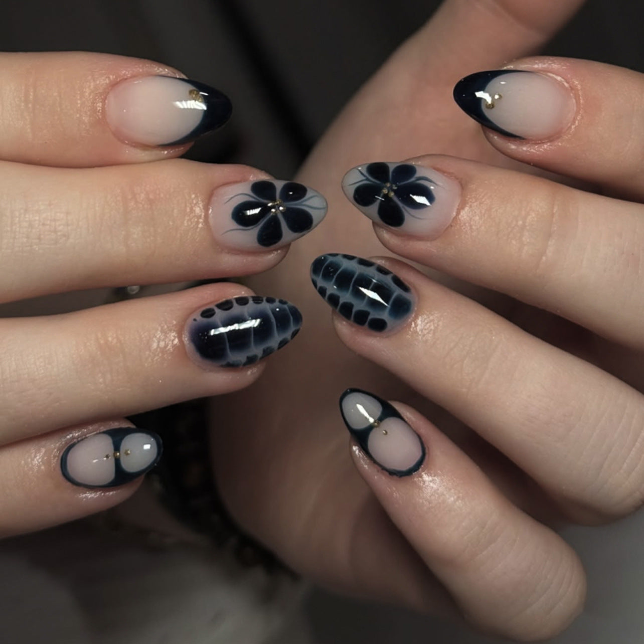 Navy Petal Accent Nails with Soft Nude Contrast