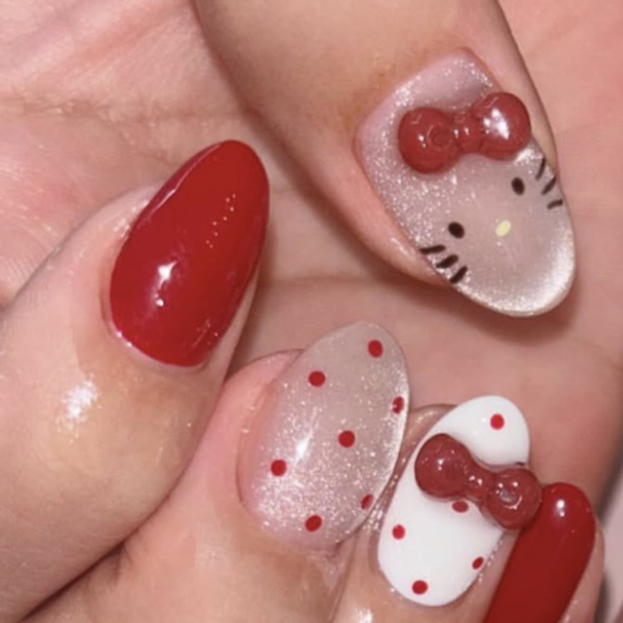 Ongles press-on style japonais œil de chat mignon avec nœud