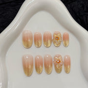 365nails: "Flor Dorada" – Uñas de Almendra Medianas hechas a mano con Ombré Floral 3D y Purpurina