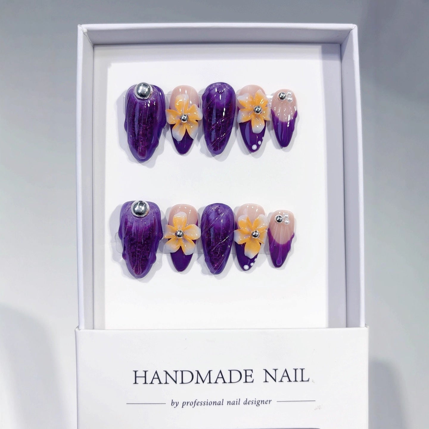 Violet Bloom: "Amethyst Flower" – Almond Press-On Nails