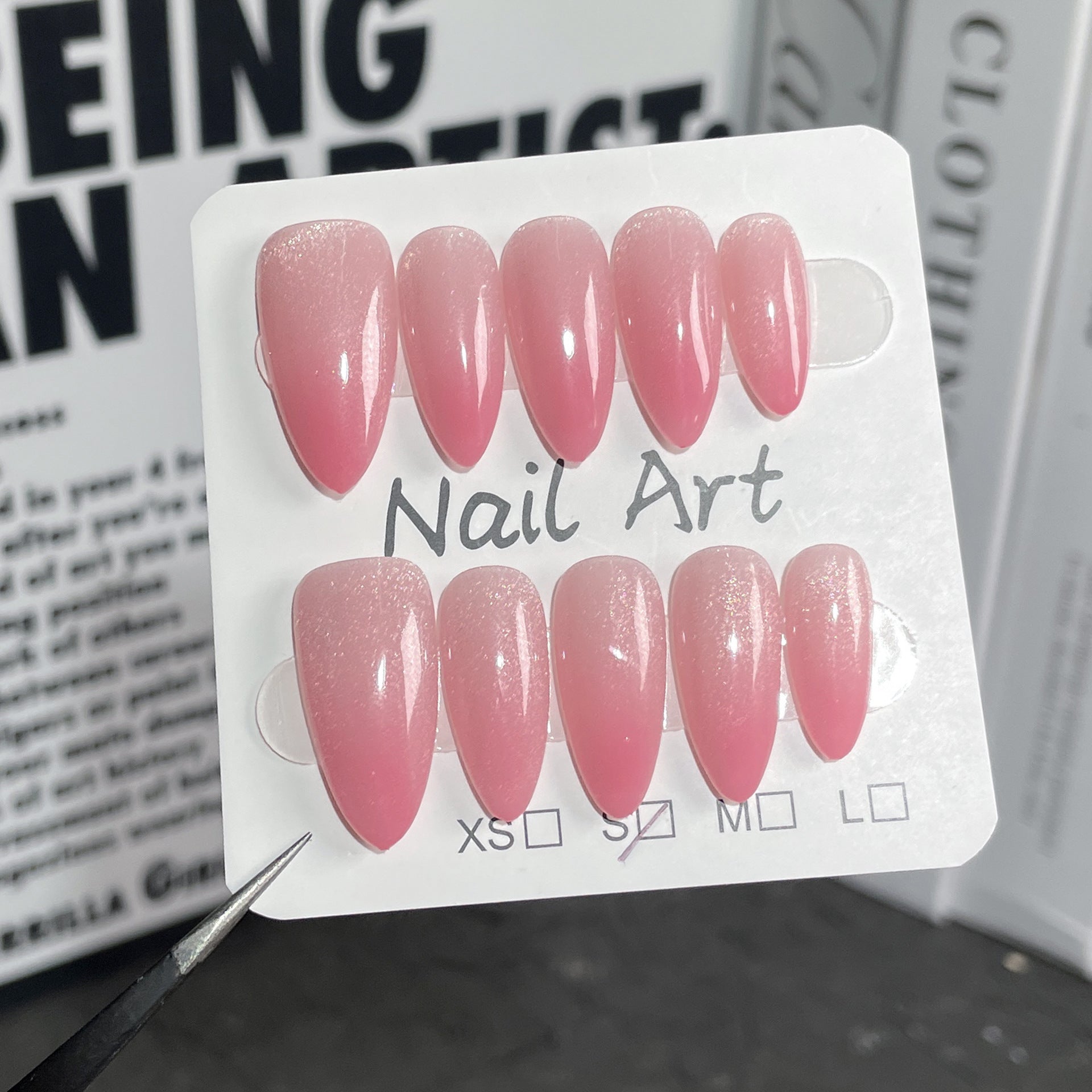 Simple Cat-Eye Pink Nails with Soft Shimmer Glow