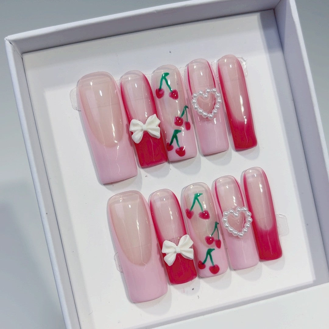 Valentine's day press-on nails: french cherry, bow, and heart designs