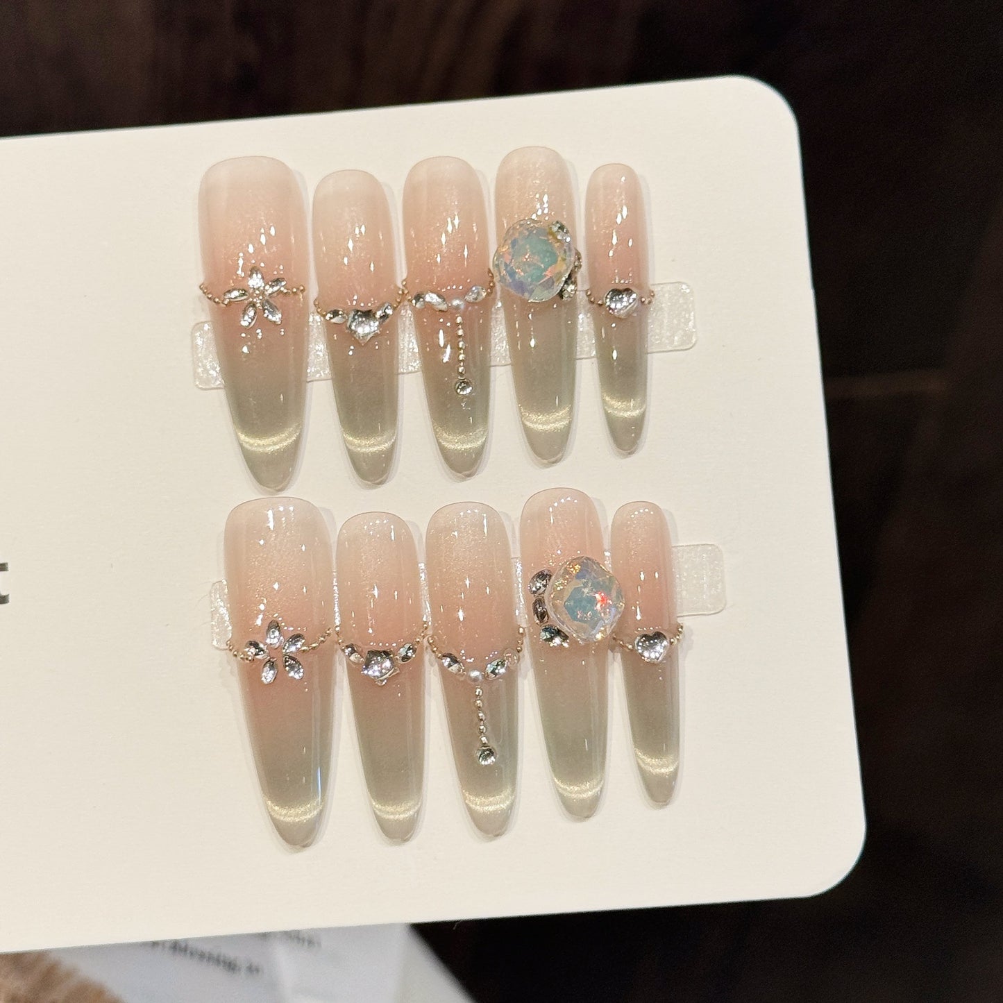 Elegant Nude Gradient Nails with Crystal Charms