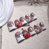 Nude French Nails with Red Accent and Crystal Floral Details