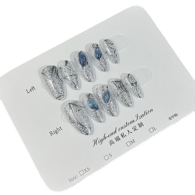 Silver Glitter Cat Eye Press‑On Nails with Blue Gem & Web Design