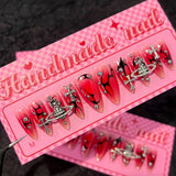 Red-Black Flame Press-On Nails | Stiletto | Handmade with Silver Cross & Planet Charms