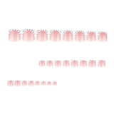 Simple french white toenail tips with black polka dot design