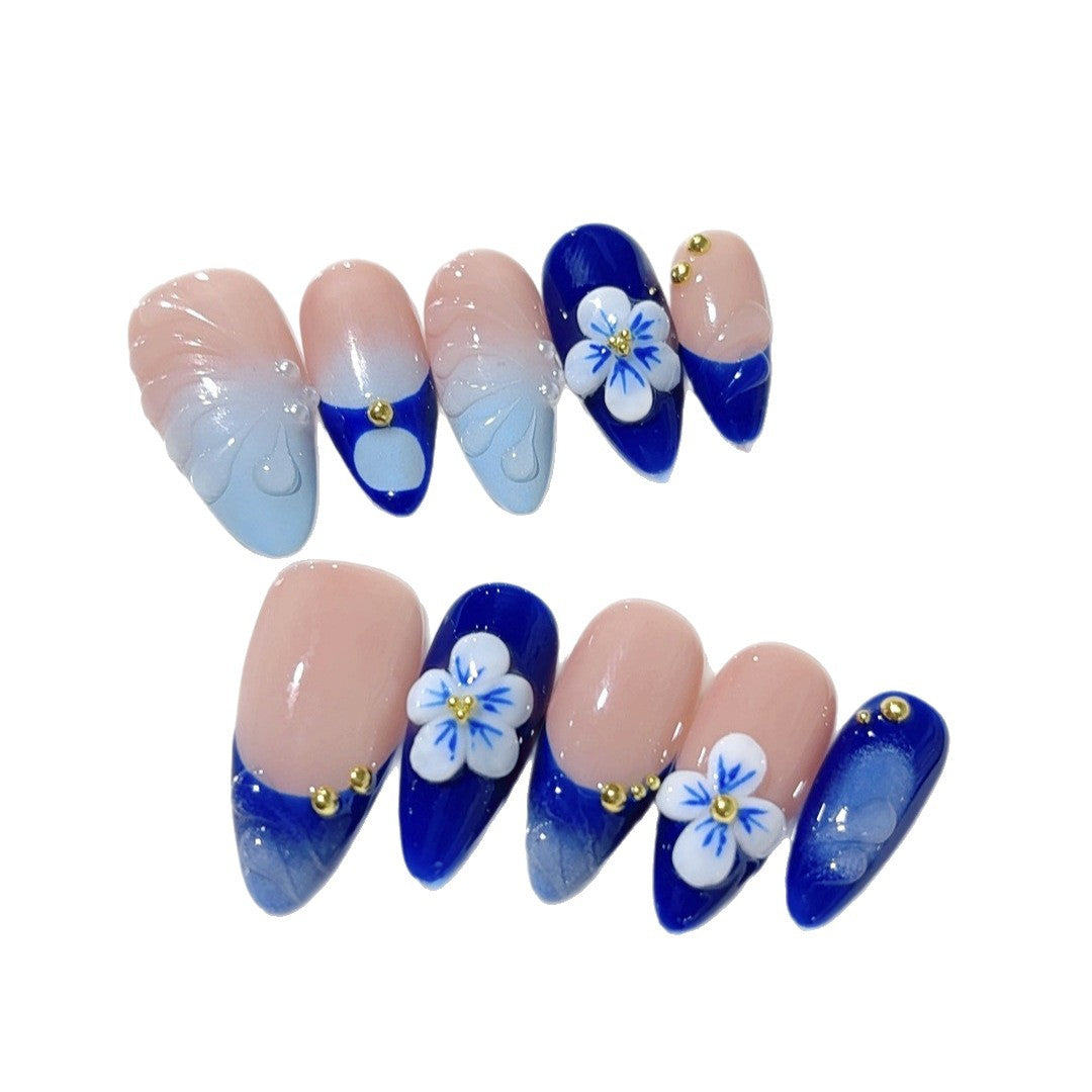 海藍花卉：蝴蝶與花 — 杏仁形穿戴甲