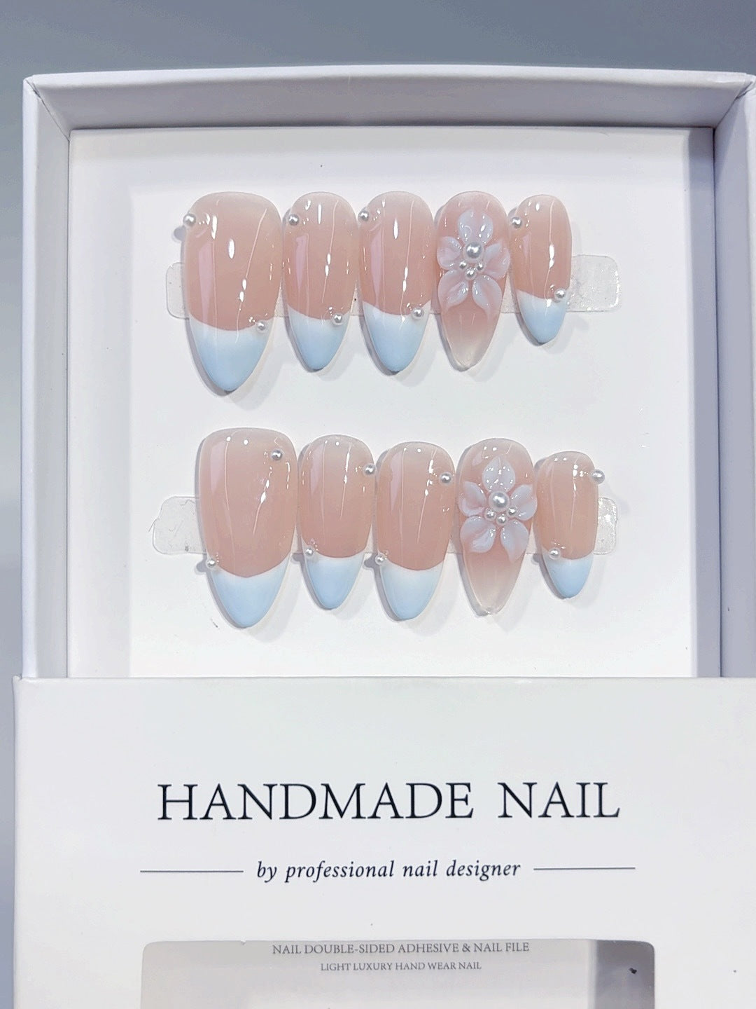 Blue Bloom: "Nude Blue French Flower" – Almond Shape Handmade Press-On Nails