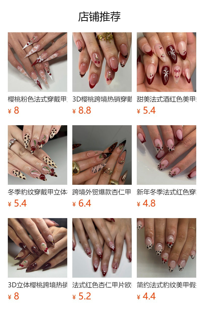 Black and white zebra print press-on nails with 3d cherry accents, french red manicure nail tips