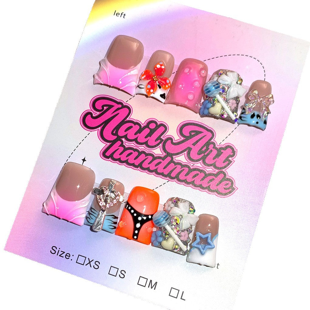 Mixed Color Nails with Sculpted Charms and Playful Details