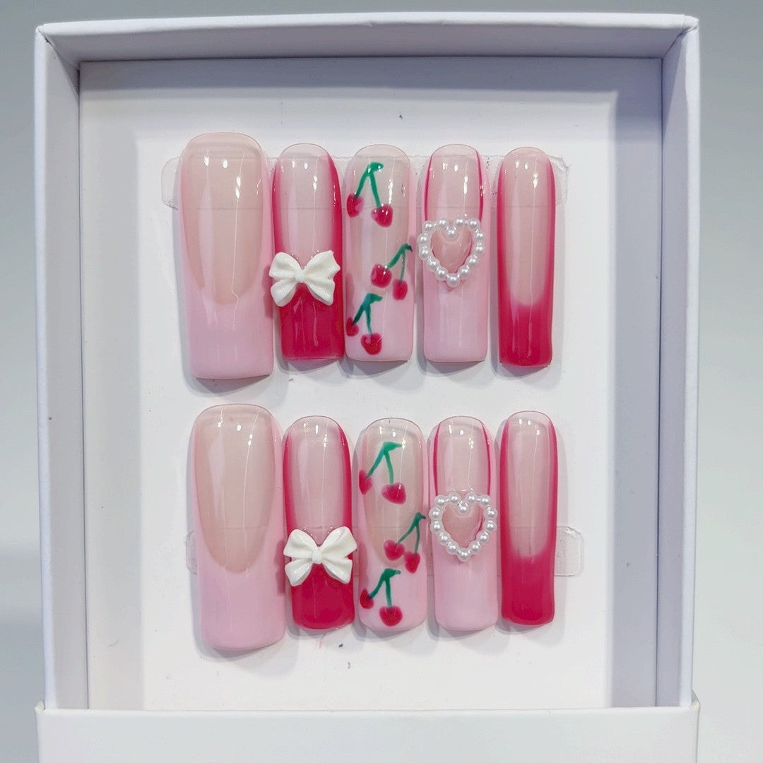Valentine's day press-on nails: french cherry, bow, and heart designs