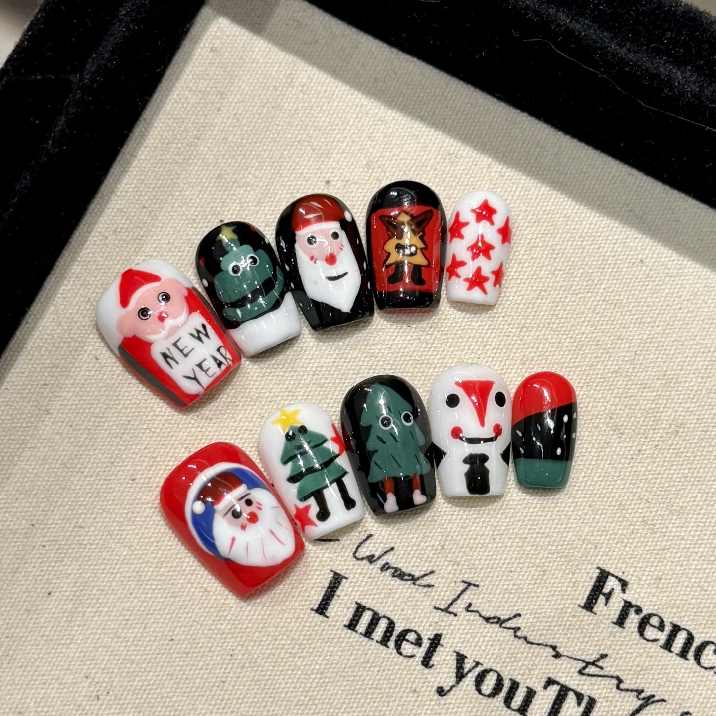 Playful Santa & Christmas Tree Press‑On Nails – Red, Black & White Short Design
