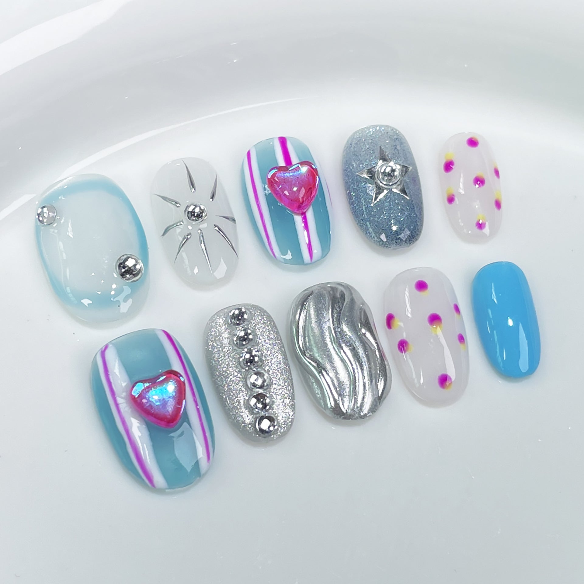 Sweet-Cool Nails with Hand-Painted Stripes and Chrome Accents