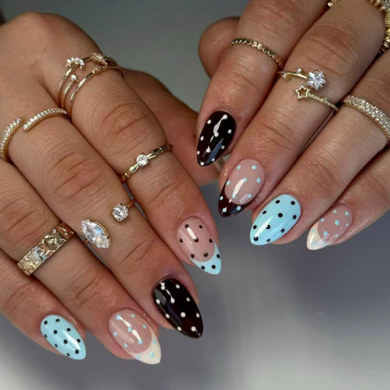 Ongles press-on manucure French — embouts forme amande à pois