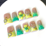 Green Yellow French Nails with Floral and Crown Charms
