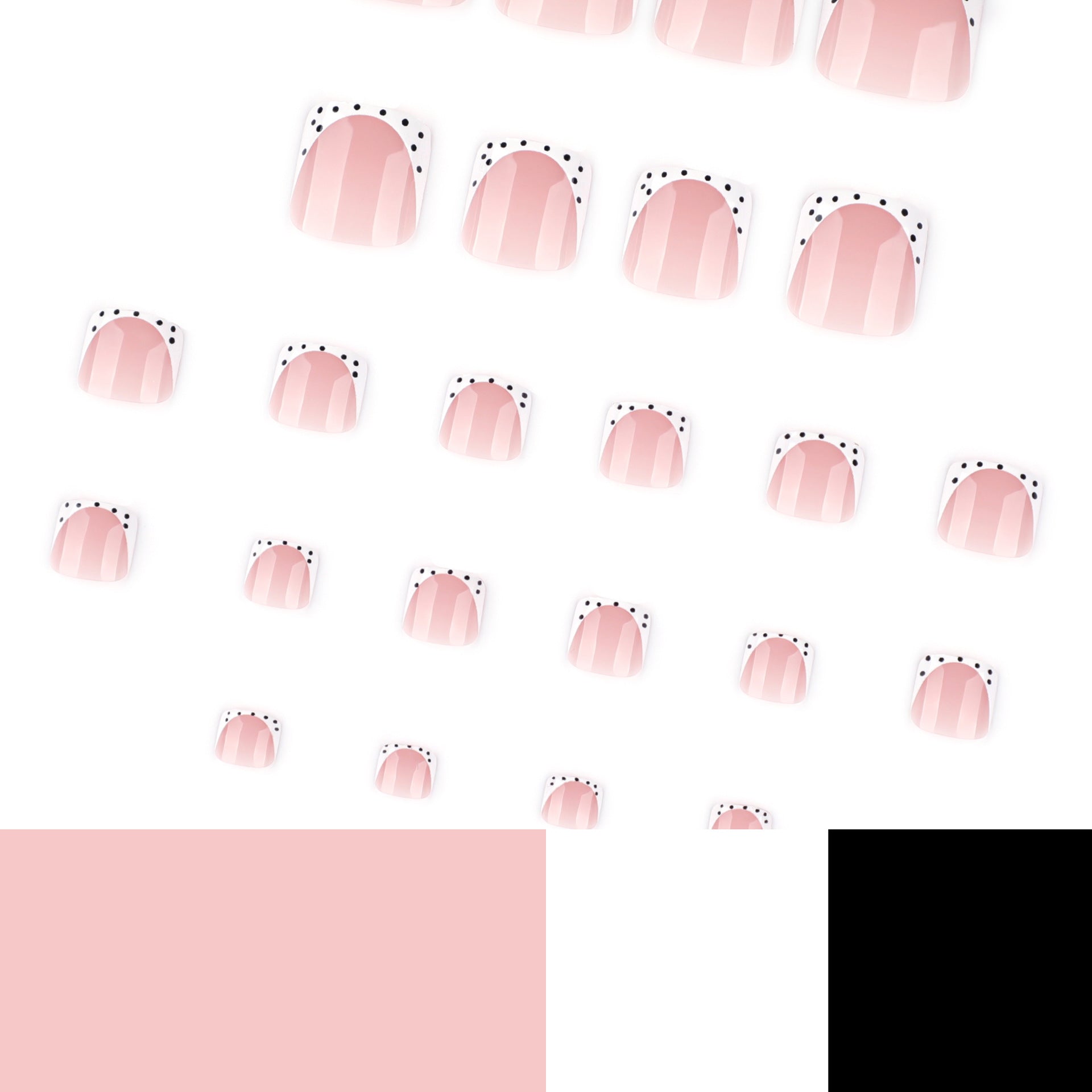 Simple french white toenail tips with black polka dot design
