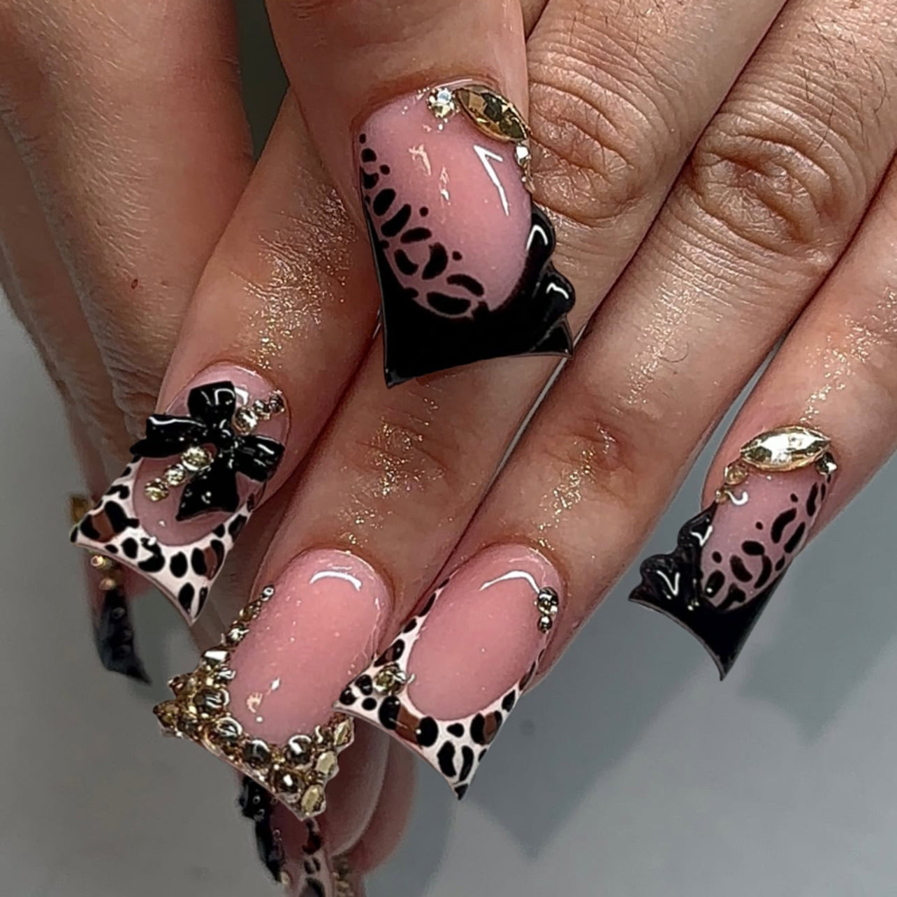 Short Almond Press On Nails with Pink Base & White Floral Accents
