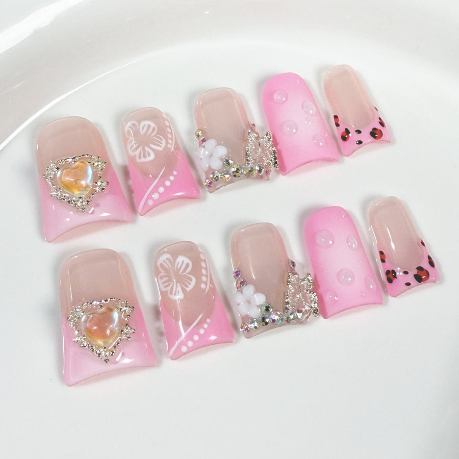Blush French Nails with Cute Leopard and Icy Heart Accents