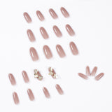 Uñas postizas con diseño de mariposa nude en color rosa oscuro | 365nails