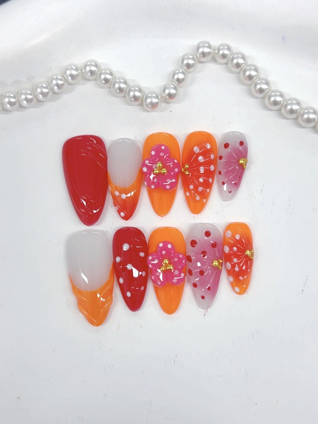 Tropical Bloom: "Coral Cherry" – Unhas Postiças Amêndoas