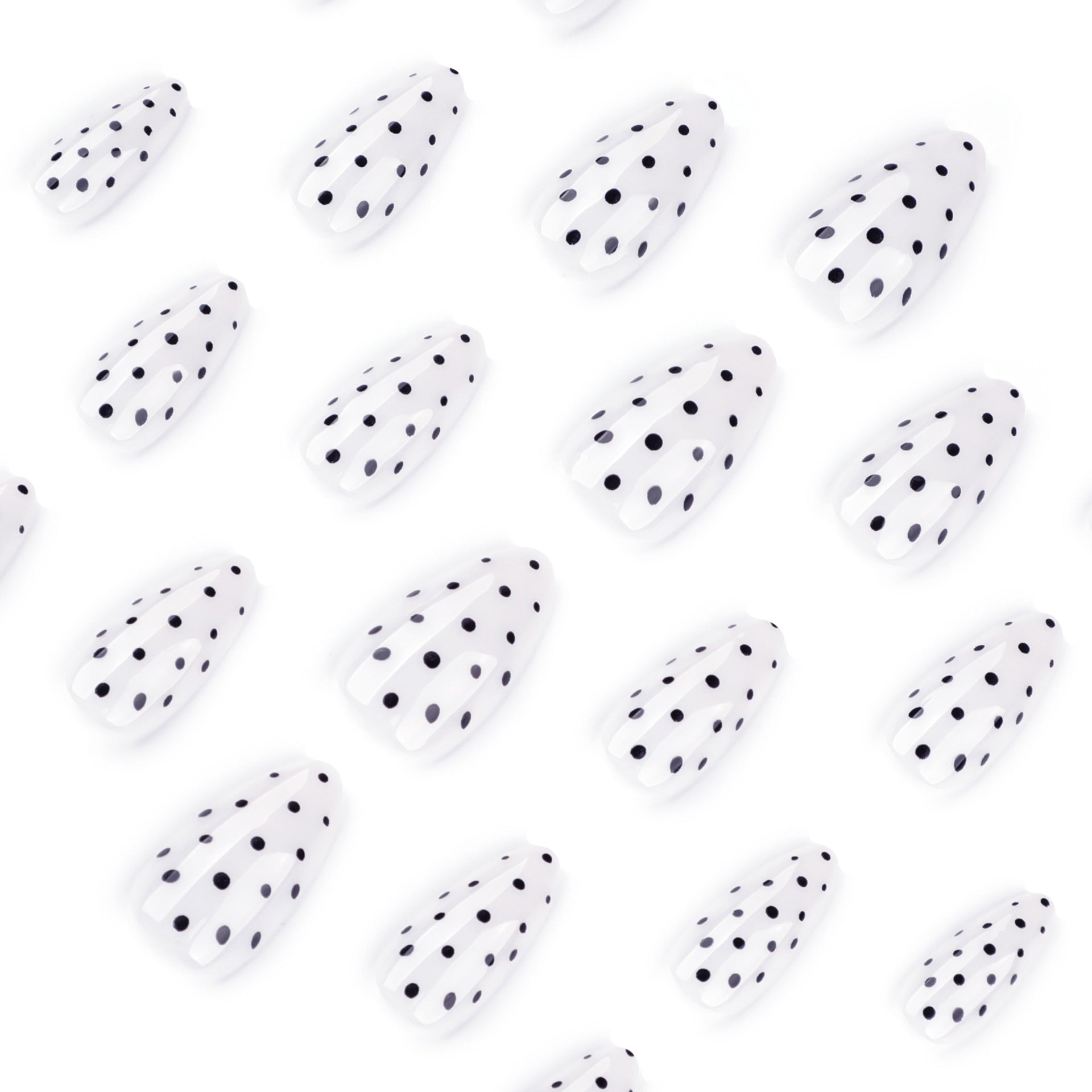 Black dots almond on white background press-on nails