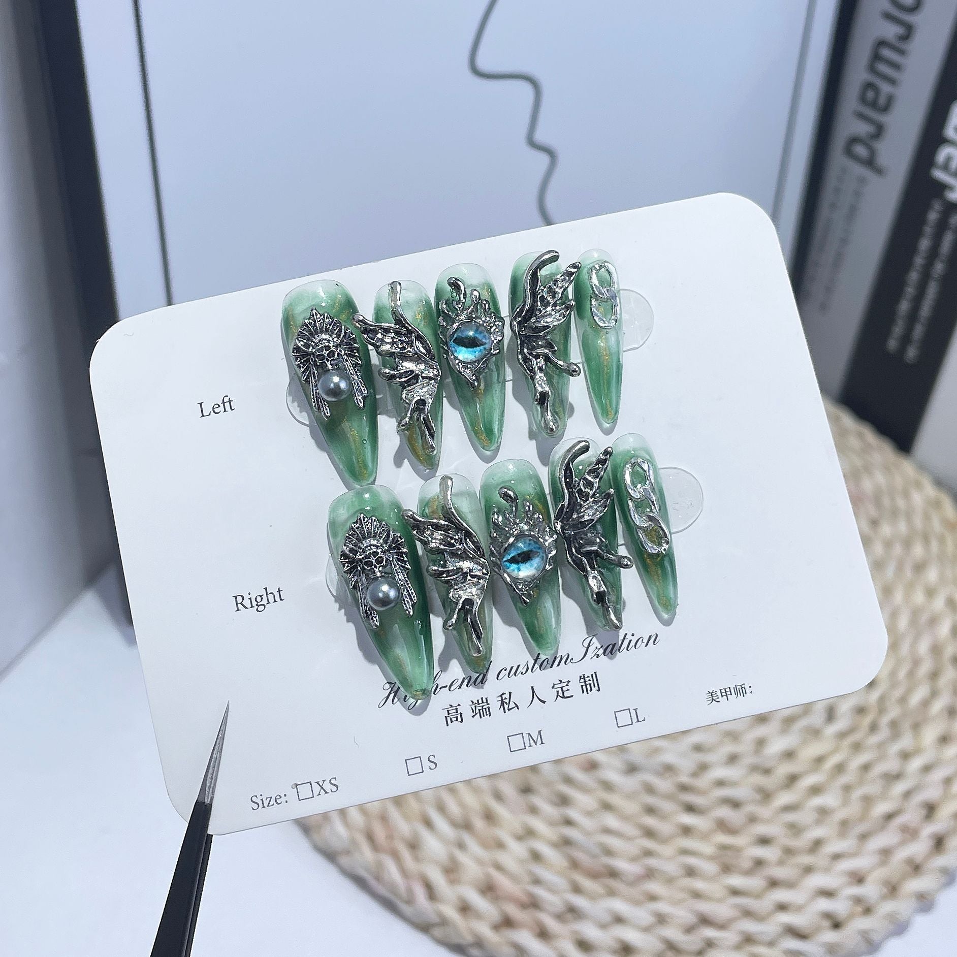 Liquid Metal Angel-Eye Nails with Sculpted Wing Accents