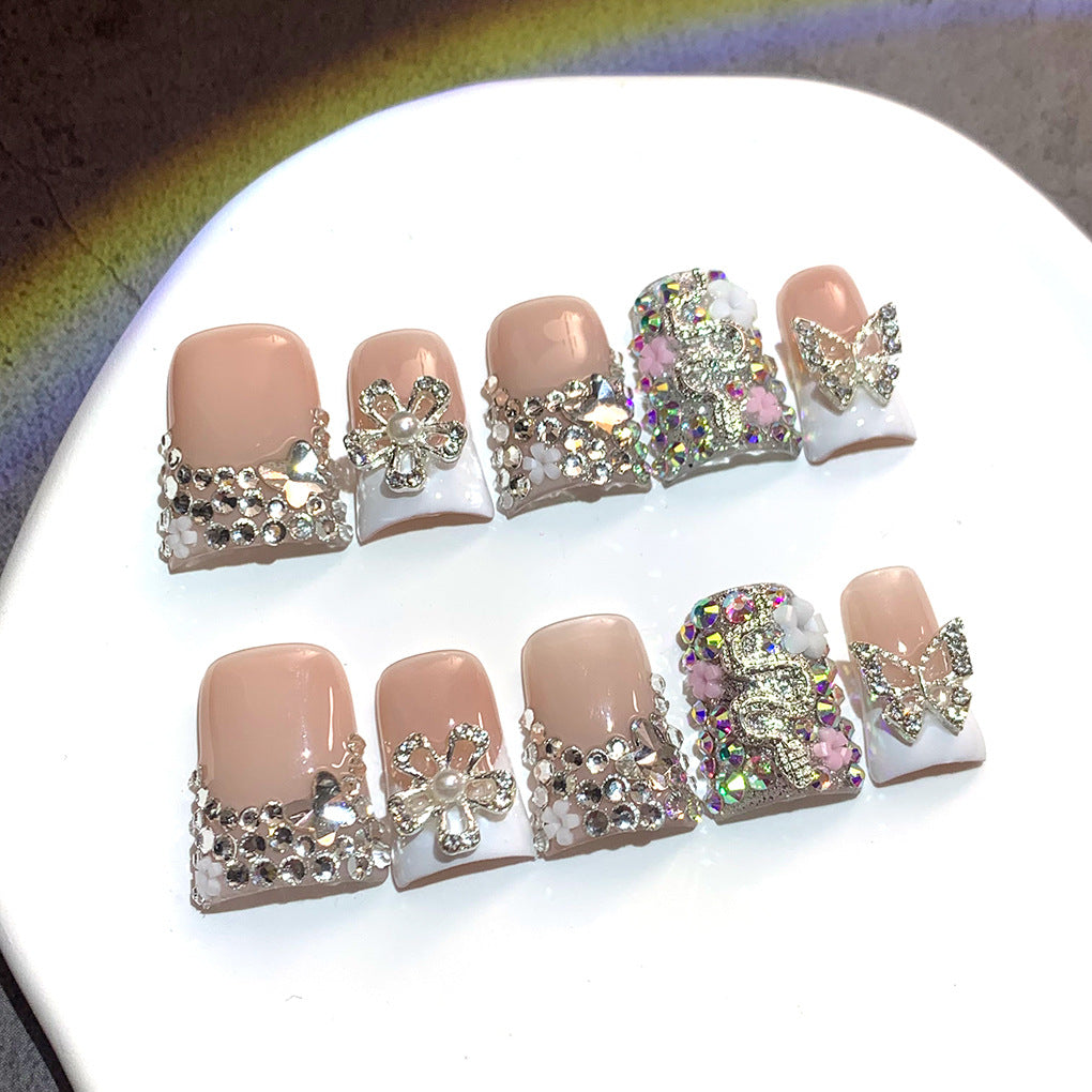Nude French Nails with Silver Butterfly Crystal Embellishments