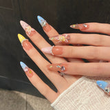 escultura de rouxinol da ilha de amêndoa pintada à mão beliscando unhas removíveis de primavera e verão feitas à mão | 365nails