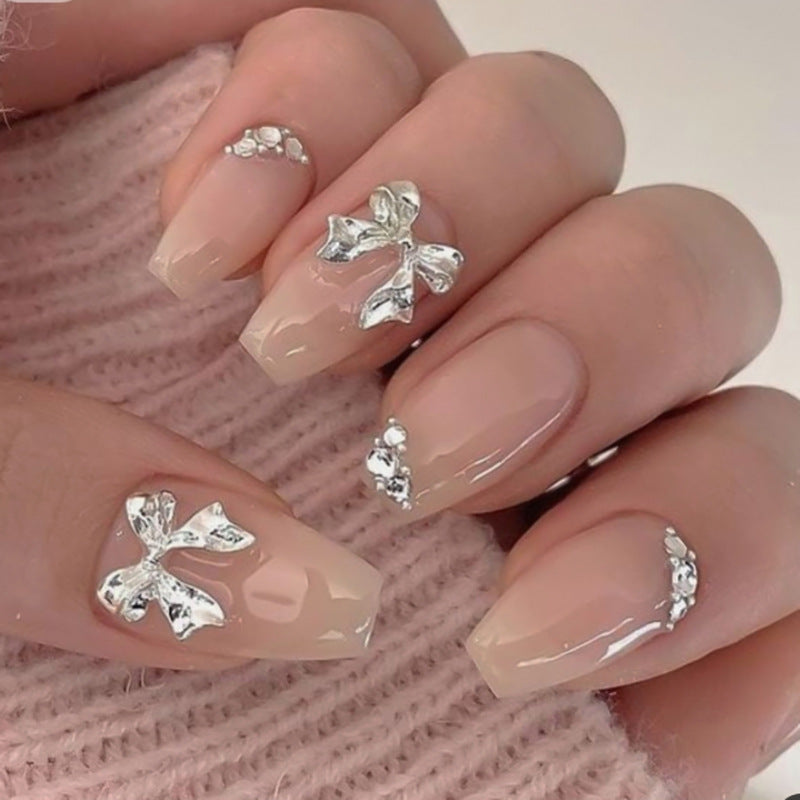 Nude Bow Accent Nails with Silver Crystal Details