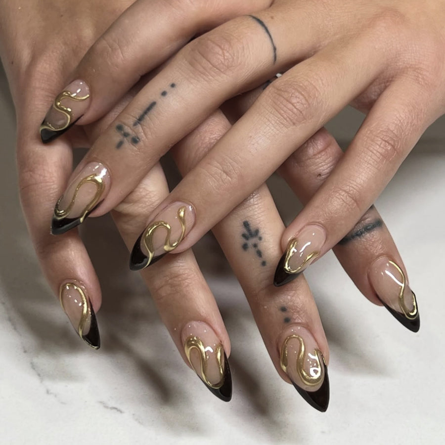 Long Almond Press On Nails with Nude Base & Black French Tip & Gold Line Accents
