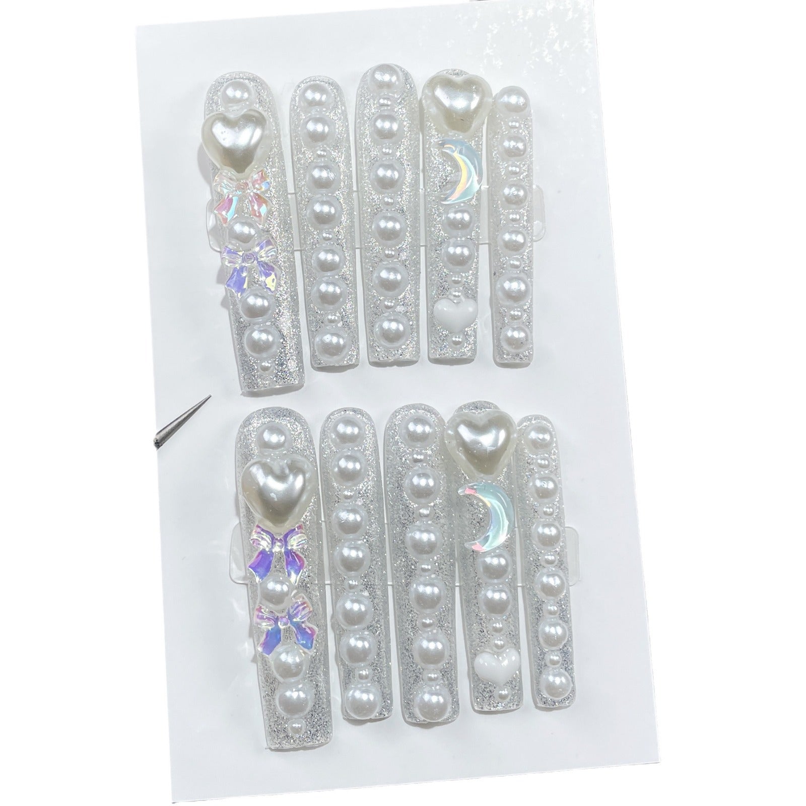 Sparkling Pearl-Encrusted Nails with Heart and Holographic Accents