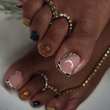 Golden diamond sparkling manicure and toe nails
