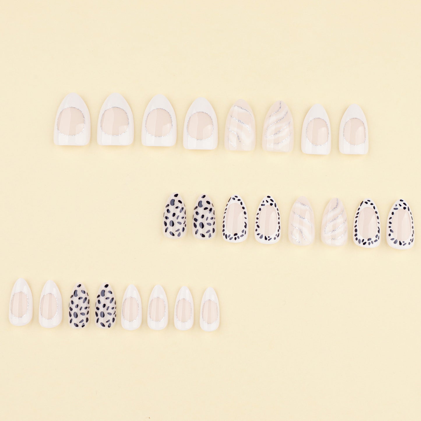 Chic Monochrome Nails with Dalmatian Spots and White Accents